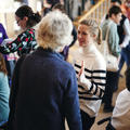 A group of people networking during a conference break